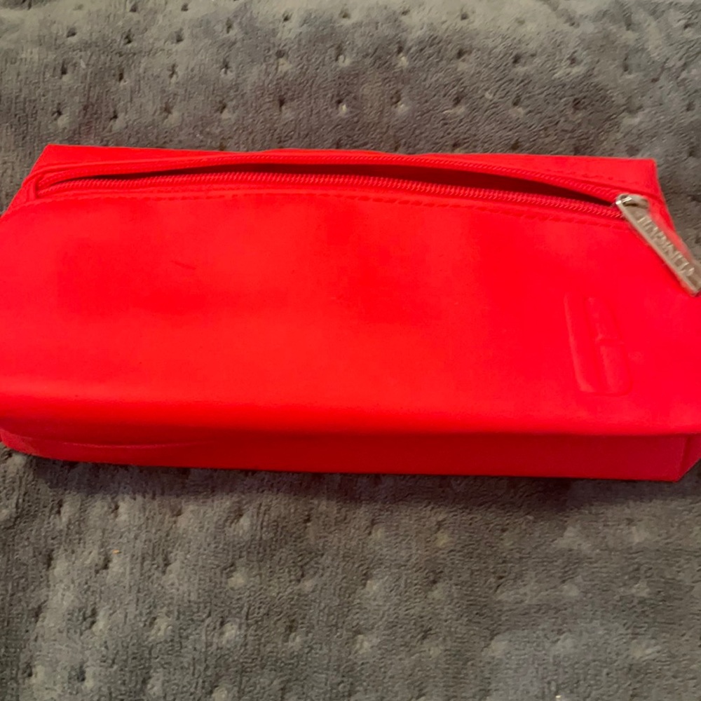 Red Clinique cosmetic bag